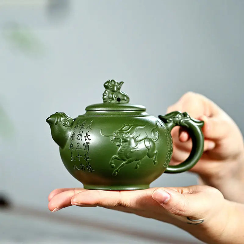 Green ceramic teapot with dragon handle and bovine relief from Kirin & Dragon jianshui zitao purple pottery teapots