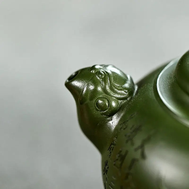 Green teapot spout with animal head from Kirin & Dragon jianshui Zitao purple pottery teapots