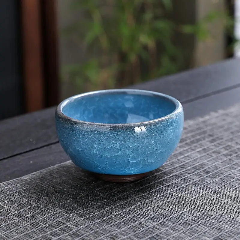 Lake Blue Zhan ceramic teacup with crackle glaze for Gongfu tea brewing