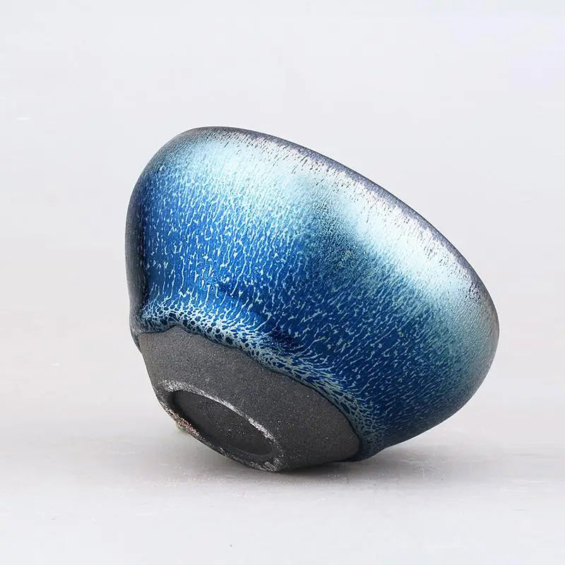 Blue glazed ceramic teacup from Laser Jian Zhan, perfect for Tenmoku tradition tea moments
