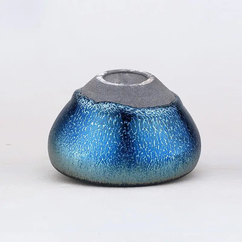 Blue iridescent ceramic vase inspired by laser Jian Zhan and tenmoku tradition for tea moments