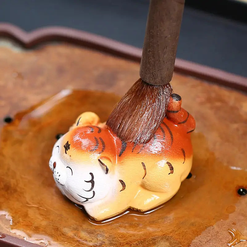 Ceramic Laughing Fortune Tiger being brushed, perfect tea pet guide Zisha clay figurine