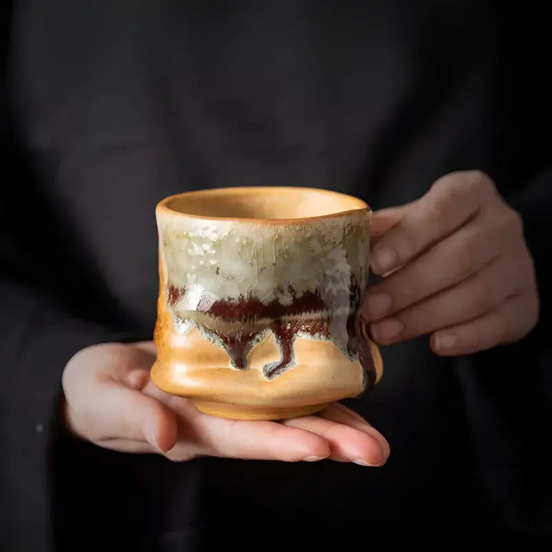Lava Whisper ceramic coffee cup with glaze drips, perfect for your ceramic coffee look