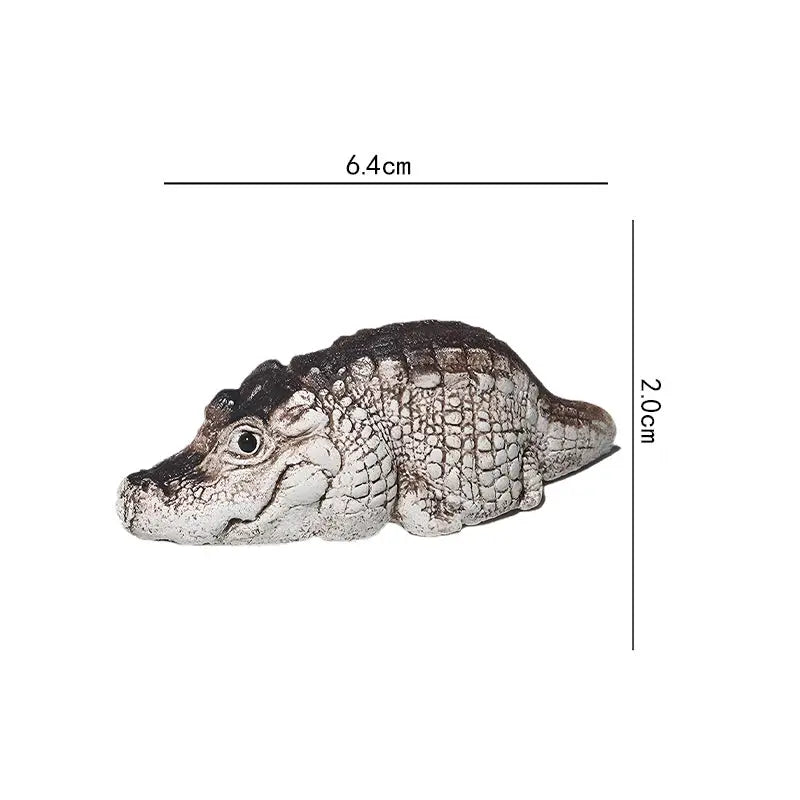 Miniature crocodile figurine tea pet made of Yixing Zisha clay for feng shui decor