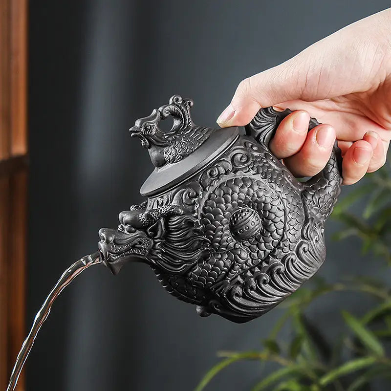 Ornate Dragon-Shaped Jianshui Teapot Pouring Water in Yunnan Purple Clay Imperial Roar Dragon Design