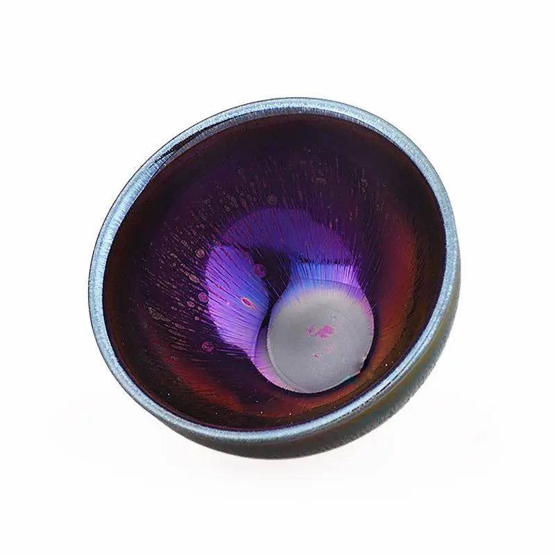 Iridescent purple ceramic bowl with tenmoku glaze inspired by Jian Zhan teacup style in deep violet