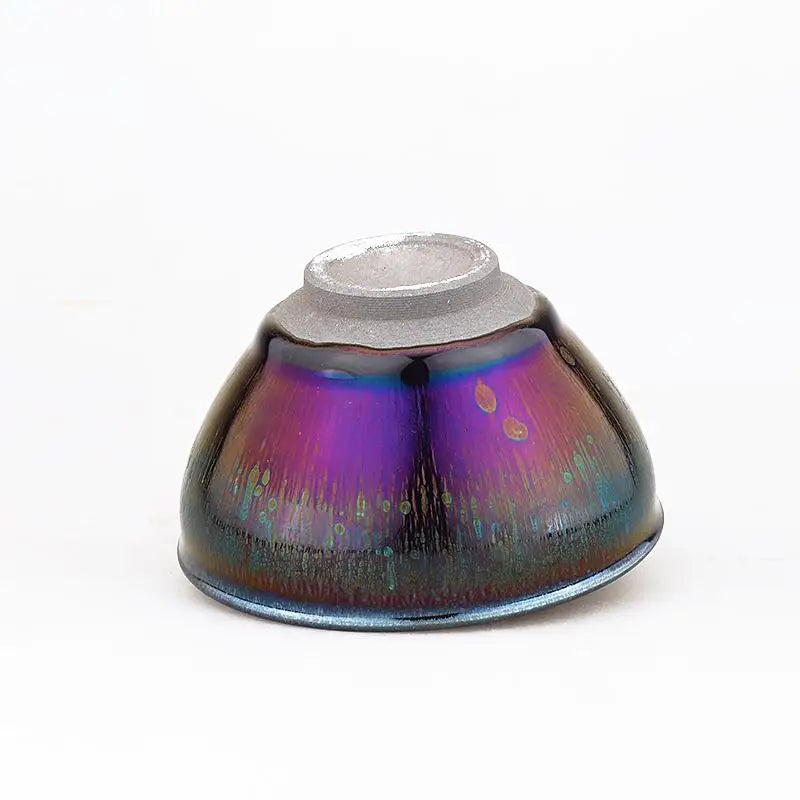 Iridescent purple and black ceramic bowl with tenmoku glaze, inspired by Jian Zhan teacup design in deep violet style