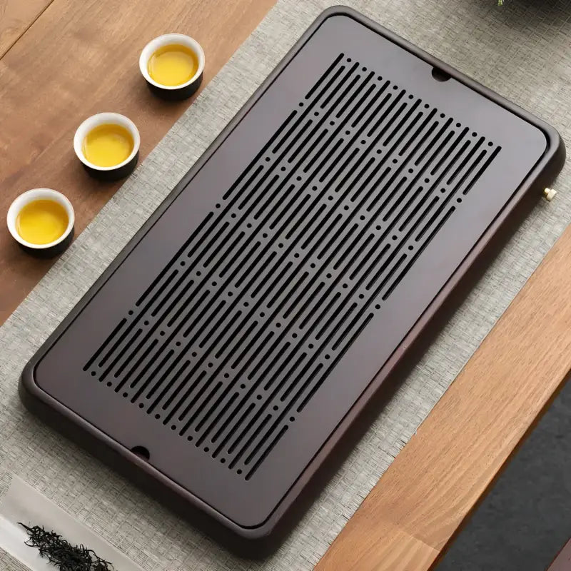 Linear Harmony bamboo tea tray with drainage slots for elegant tea serving