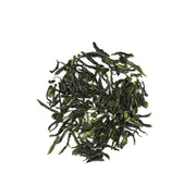 Pile of dried green tea leaves from Liu An Gua Pian roasted elegance in a leaf at Red Stone Valley