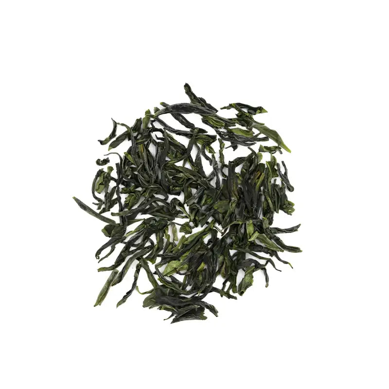 Pile of dried green tea leaves from Liu An Gua Pian roasted elegance in a leaf at Red Stone Valley