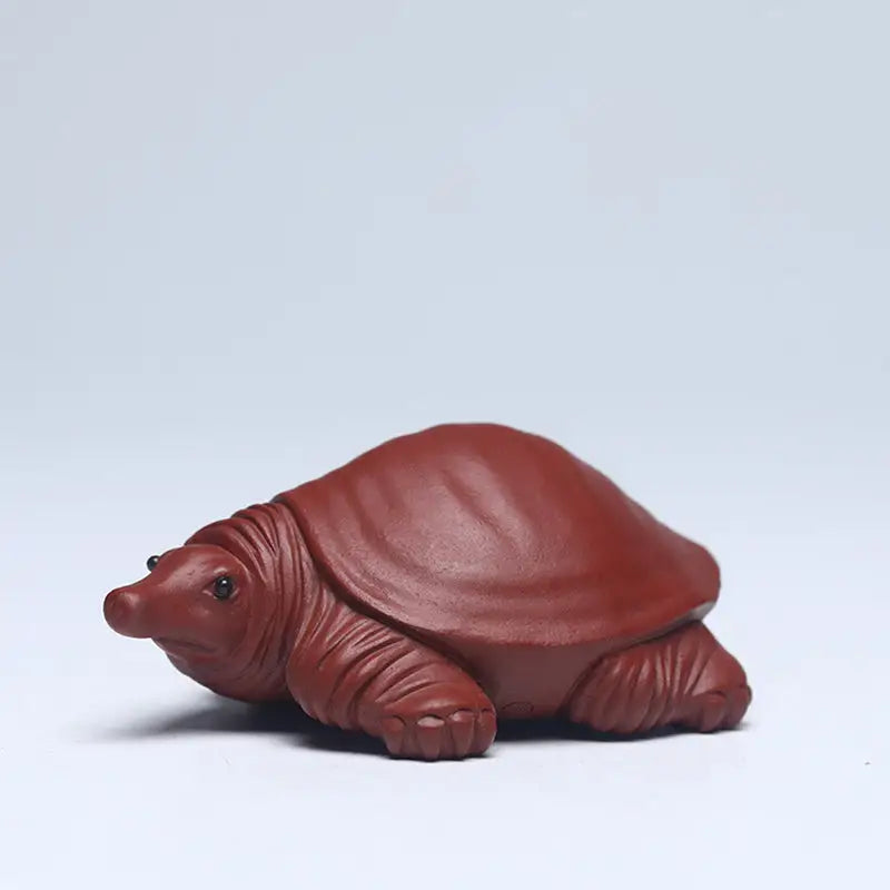 Reddish-brown softshell turtle figurine as Longevity Turtle tea pet made from Yixing Zisha clay