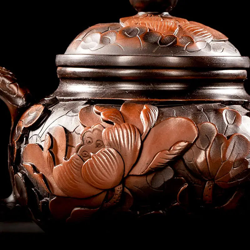 Ornate brown Teapot with floral carvings from Lotus Flower Jianshui for Gongfu Tea Enthusiasts