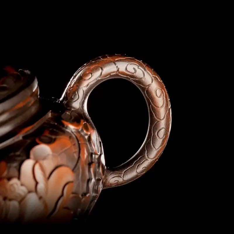 Ornate brown teapot handle of Lotus Flower Jianshui for gongfu tea enthusiasts