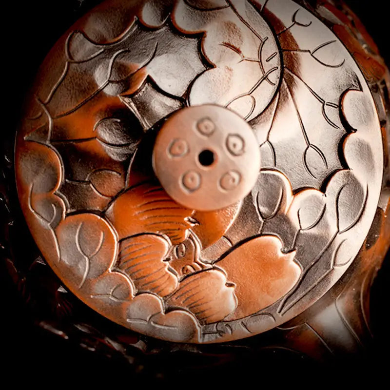 Ornate carved circular box with knob featuring a lotus flower design in purple clay Jianshui Zitao