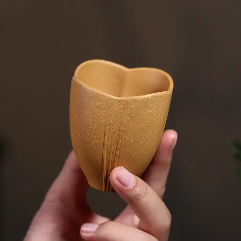 Heart-shaped textured ochre Lotus Heart Zisha cup, authentic Yixing heart Zisha cup