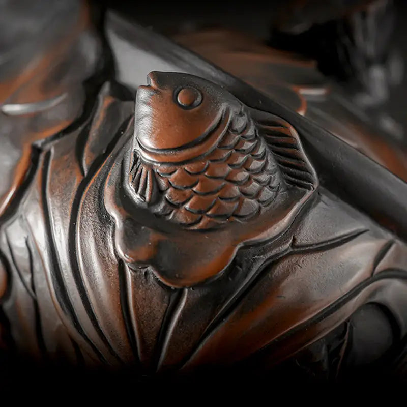 Carved wooden fish sculpture inspired by Lotus Pod, perfect for Jianshui Zitao teapots