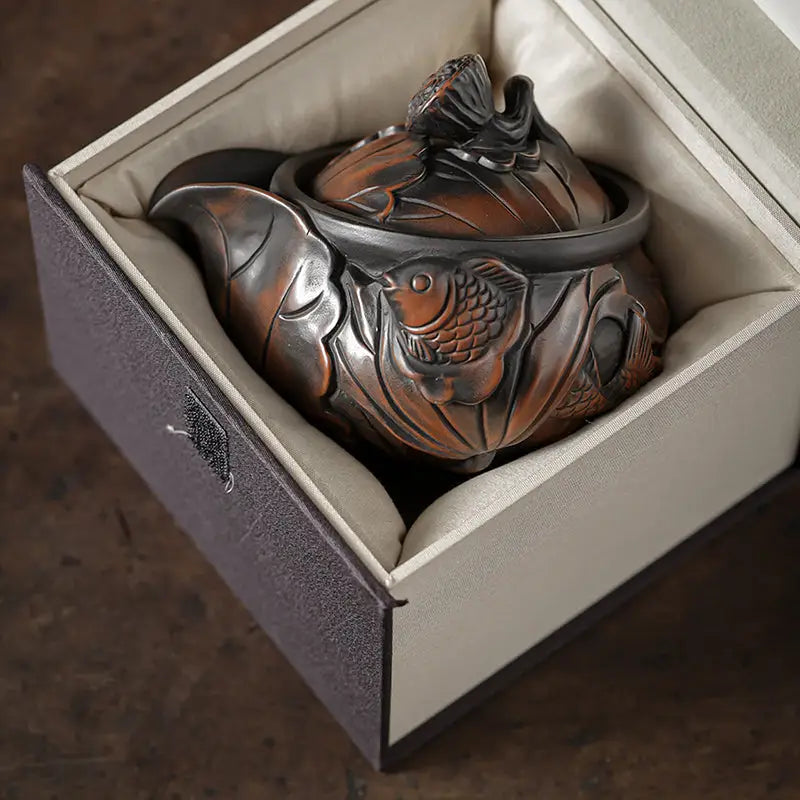Ornate fish-themed Lotus Pod teapot in box | Jianshui Zitao teapots collection