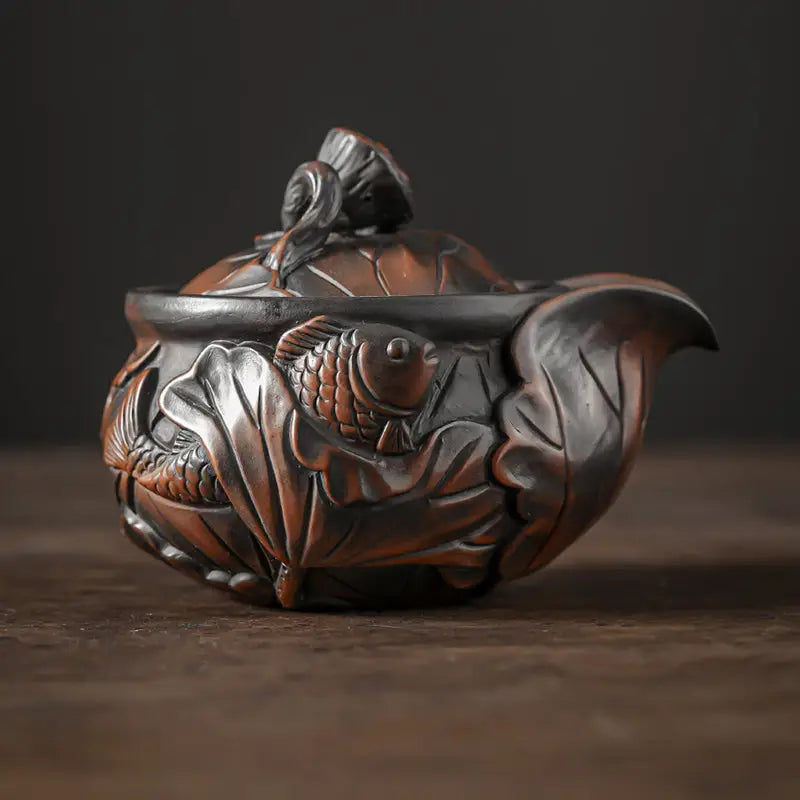 Ornate brown ceramic teapot from Lotus Pod by Jianshui Zitao, a unique teapots design