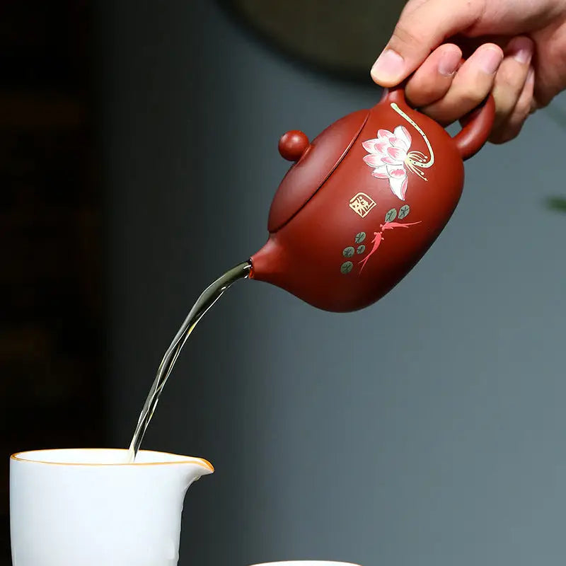Red-brown Yixing Zisha teapot with hand-painted lotus floral design