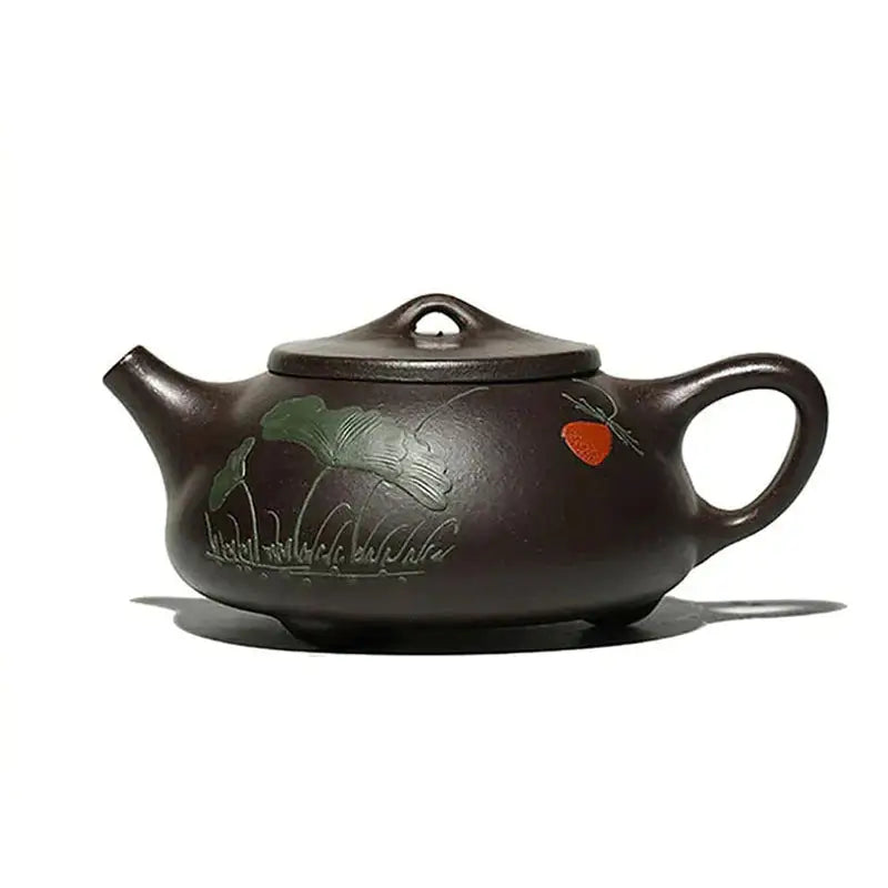 Brown Yixing Zisha teapot with hand-carved lotus design in Zisha clay for Lotus Whisper