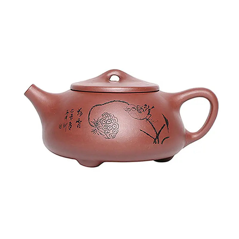 Reddish-brown Lotus Whisper Yixing teapot with floral designs and lotus pods