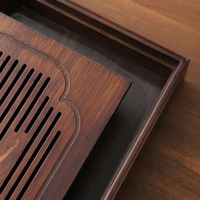 Wooden tea tray with slotted top from Magpie Song Bamboo Tea Tray collection