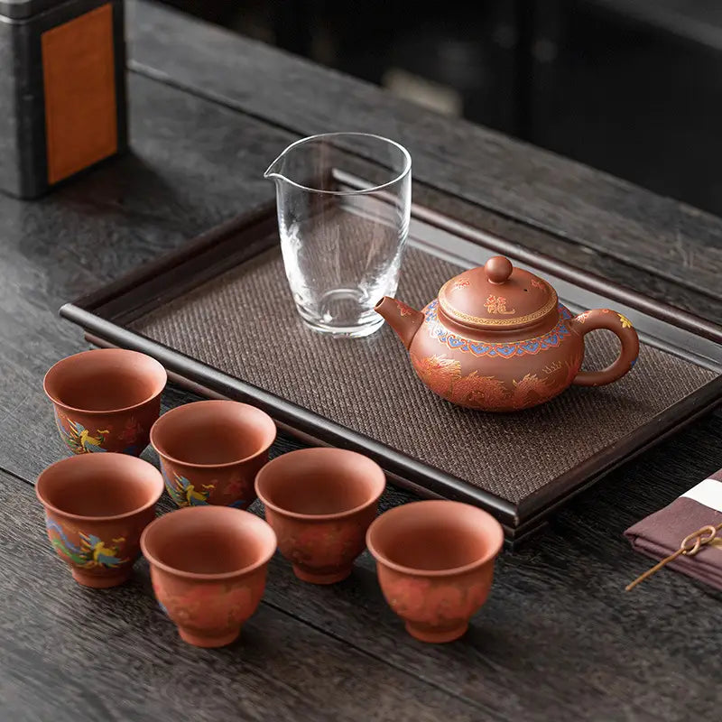Majestic Harmony Tea Set with Phoenix Motifs in Yixing Zisha