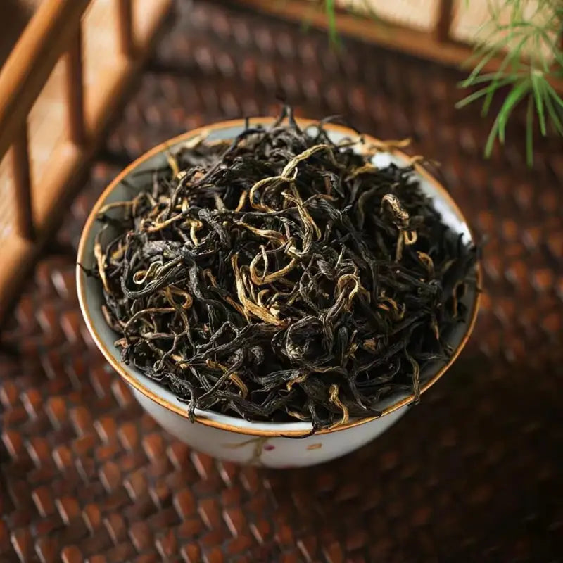 Loose black tea leaves of Meizhan Jin Jun cultivar Gold Tips from Xingcun Village Black Tea harvest