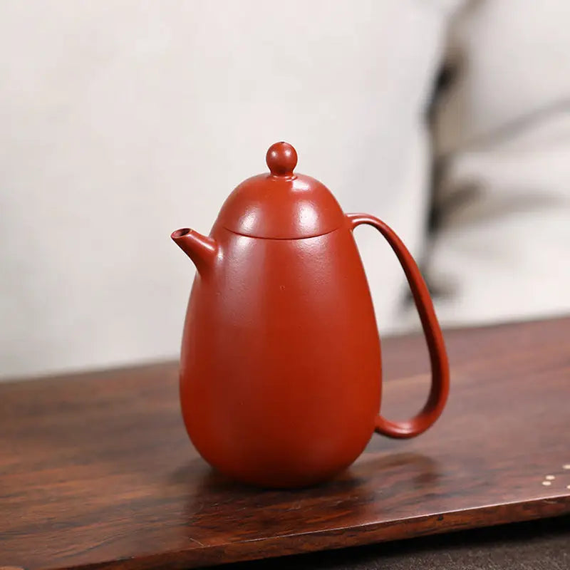 Red-brown ceramic Yixing teapot from Modern Simplicity in red clay style