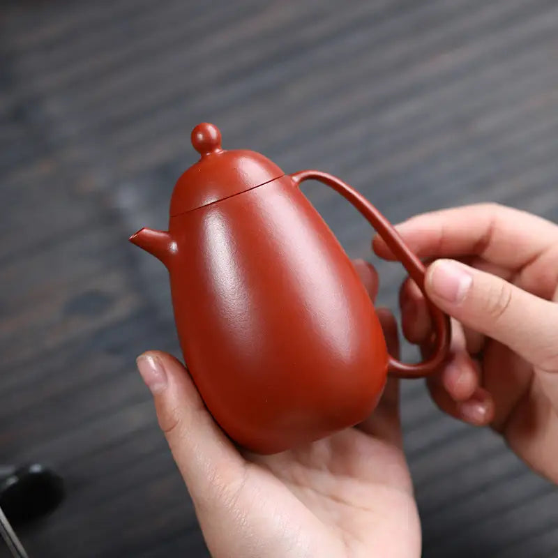 Reddish-brown ceramic Yixing teapot from Modern Simplicity made of red clay