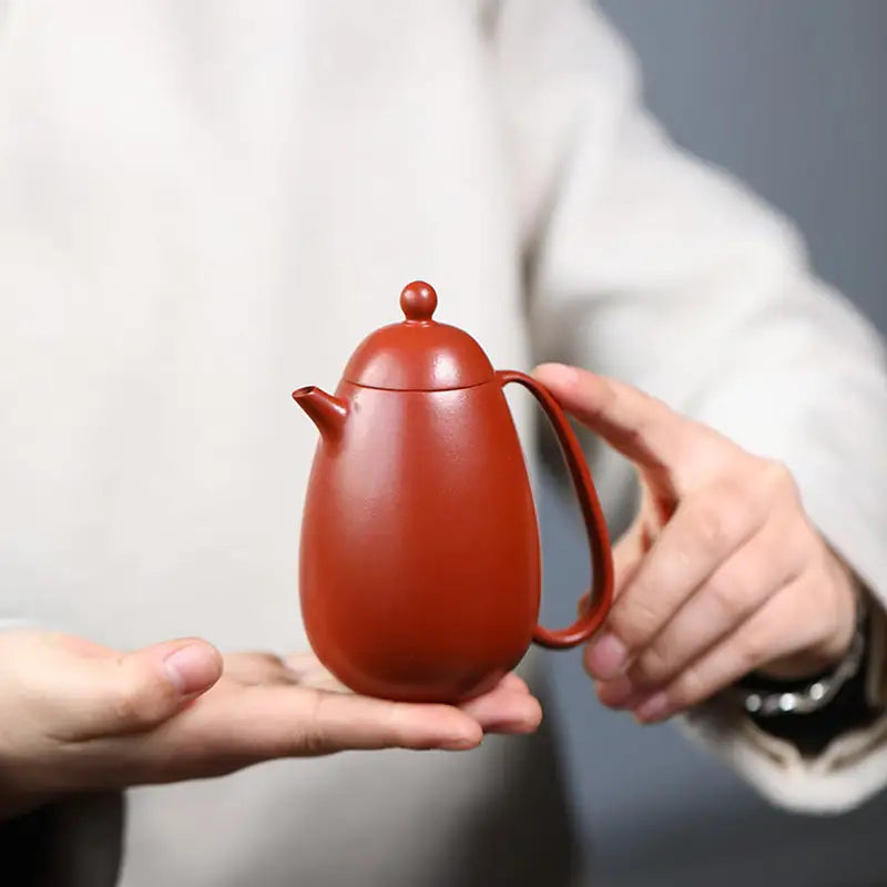 Red-brown ceramic Yixing teapot from Modern Simplicity collection in red clay
