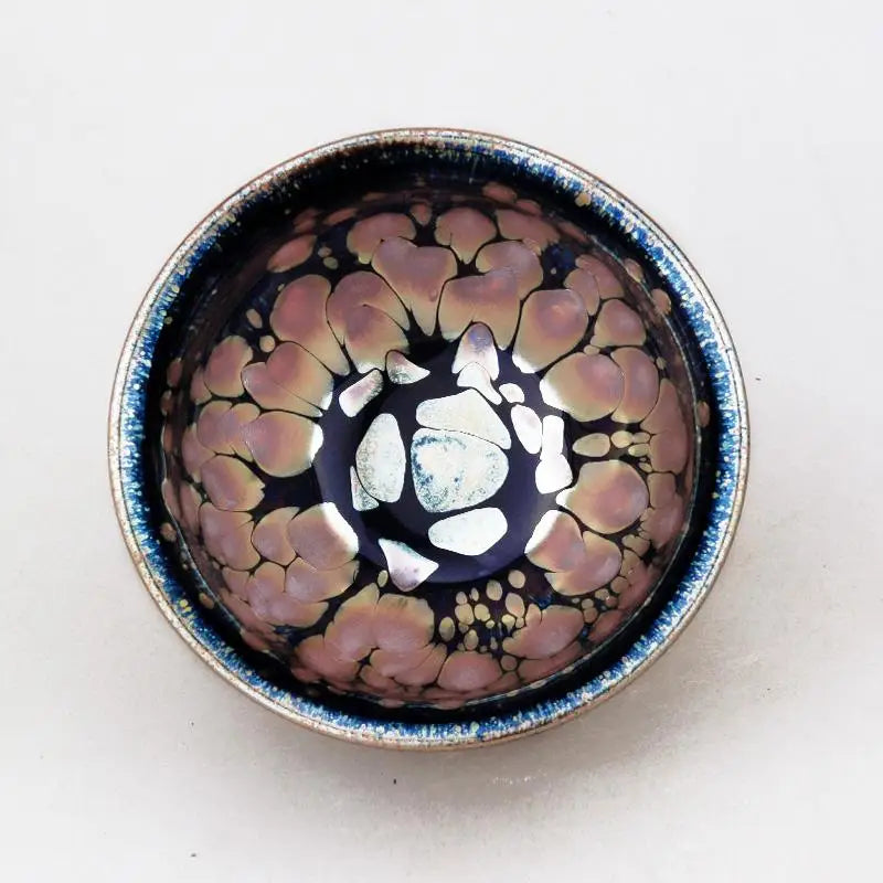 Iridescent ceramic bowl from Molten showcasing Molten Jian Zhan Tenmoku ceramics for gongfu tea