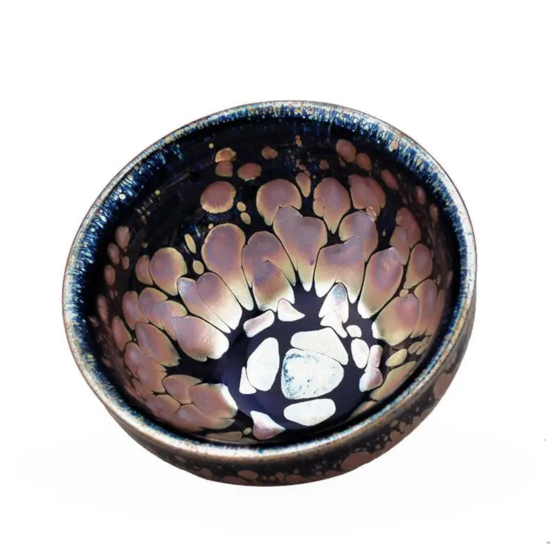 Dark blue Molten Jian Zhan with iridescent floral pattern, ideal for Gongfu tea brewing