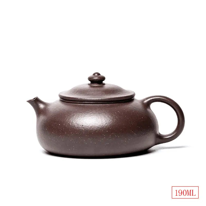 Brown ceramic teapot from Moon Drop, perfect for Yixing Purple tea rituals