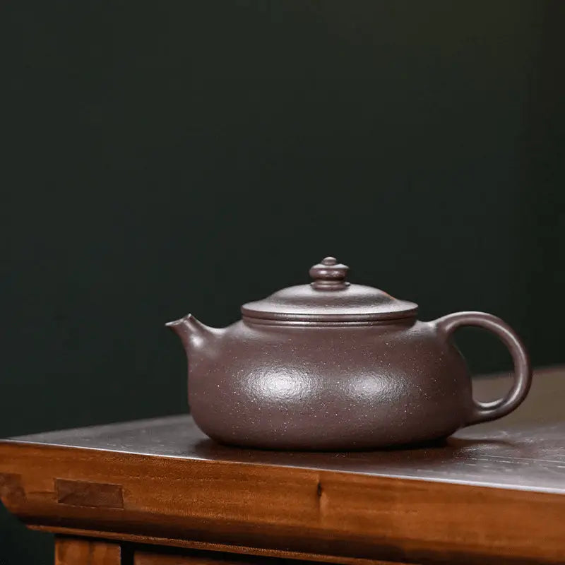 Brown ceramic teapot from Moon Drop ideal for Yixing Purple Tea Rituals