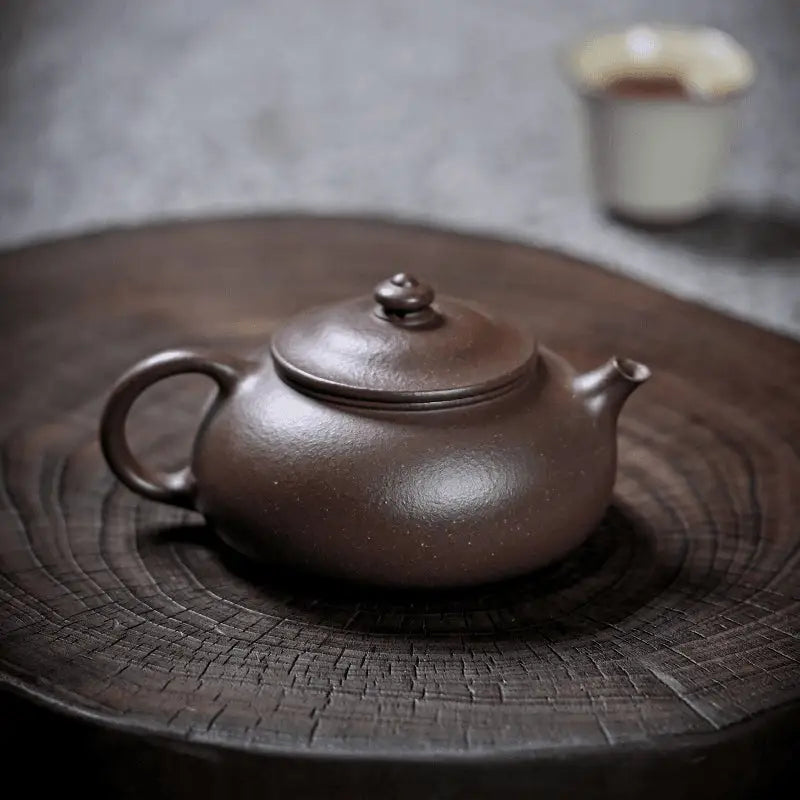 Brown clay teapot from Moon Drop for Yixing purple tea rituals