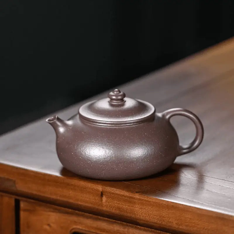 Brown ceramic teapot from Moon Drop for yixing purple tea rituals