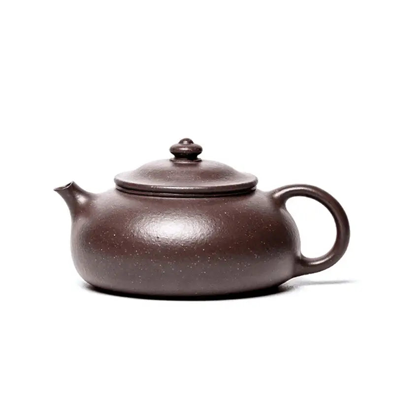 Brown ceramic Yixing purple teapot Moon Drop for elegant tea rituals