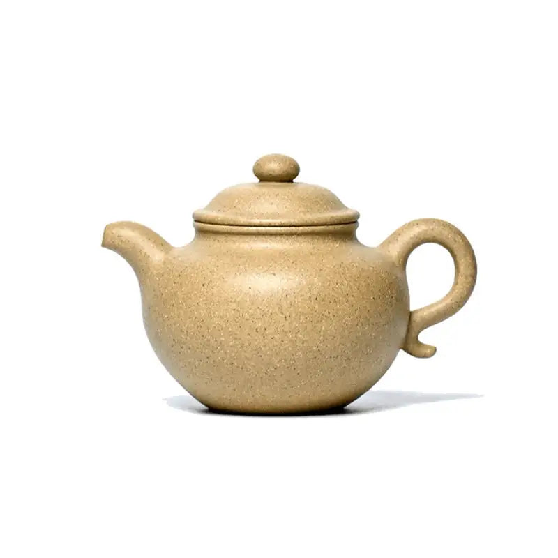 Tan ceramic teapot with curved handle from Morning Grain, Yixing Zisha Yixing Duanni style