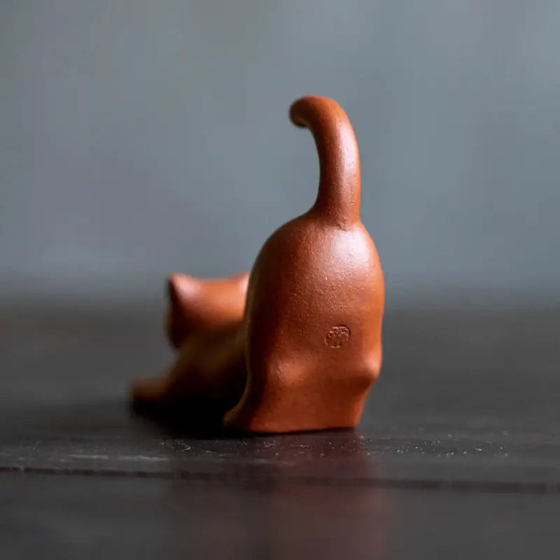 Terracotta stretching cat figurine from Morning Stretch tea pet guide Yixing Zisha clay