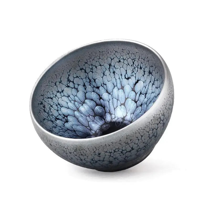 Blue-toned crackled ceramic tea cup from Nebula Jian Zhan for gongfu tea brewing