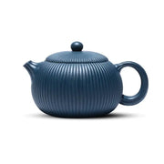 Blue ceramic yixing zisha teapot with midnight ripple finish and vertical ridges