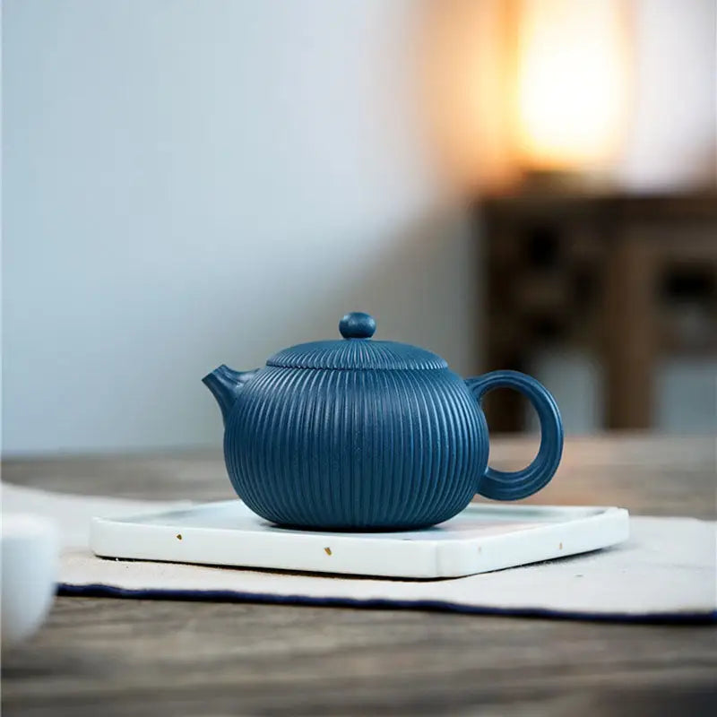 Blue ceramic yixing zisha teapot with midnight ripple and vertical ridges design