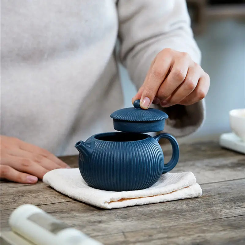 Blue Yixing Zisha Teapot with Midnight Ripple finish and vertical ridges