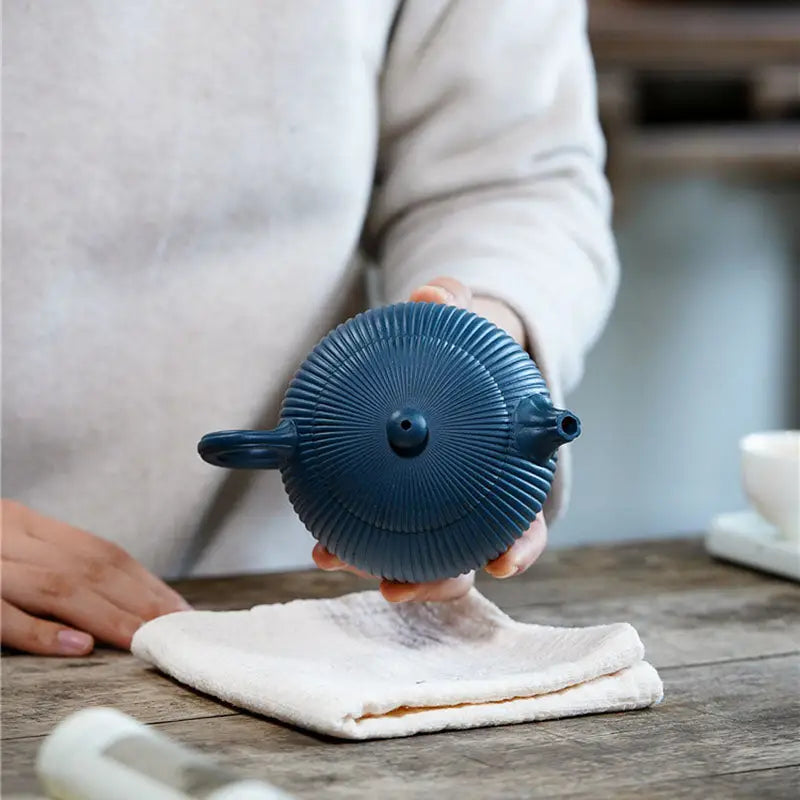 Blue yixing zisha teapot with midnight ripple finish and vertical ridges