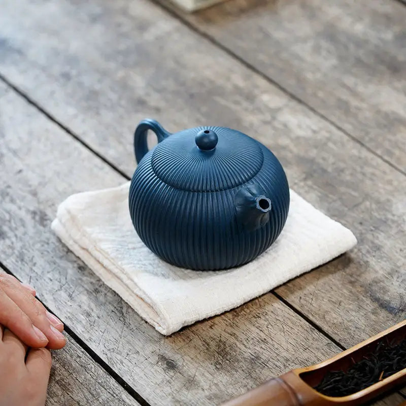 Blue ceramic Yixing Zisha teapot with midnight ripple and vertical ridges design