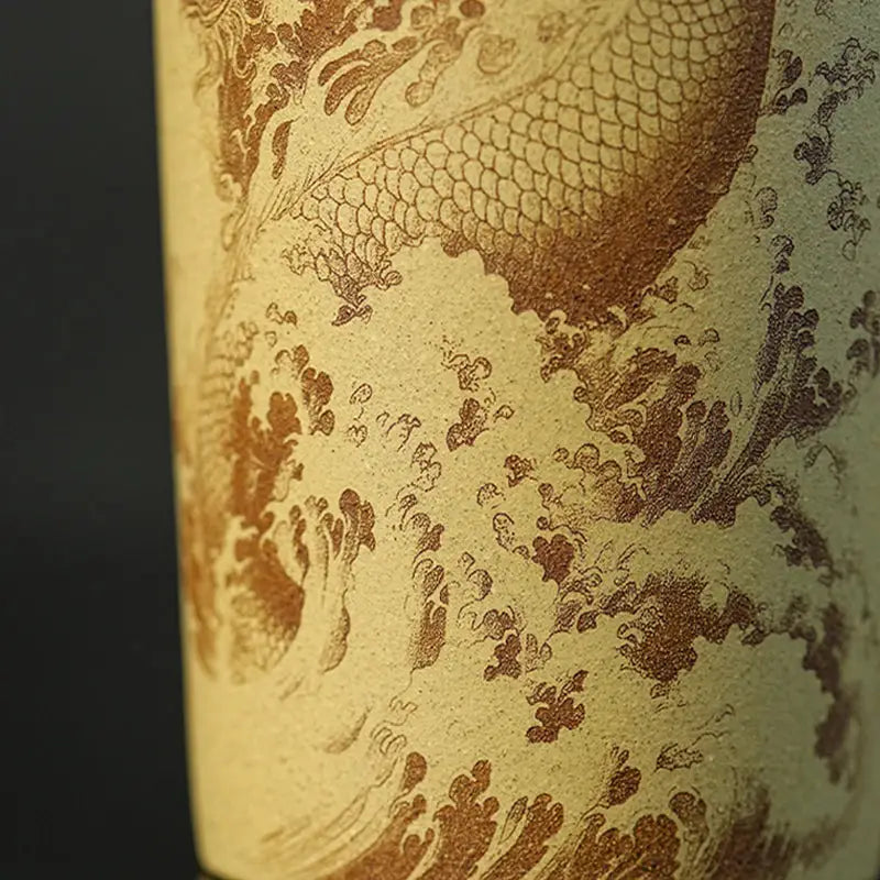 Ocean Dragon Yixing Zisha teapot with cylindrical container featuring dragon and wave design