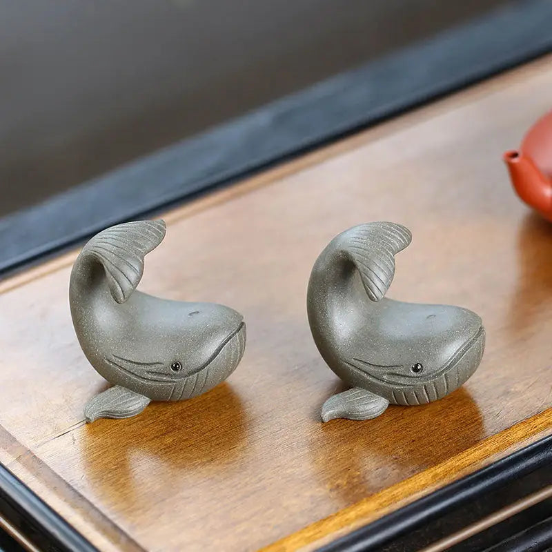 Ocean Whisper whale tea pet figurines made from gray ceramic yixing zisha clay