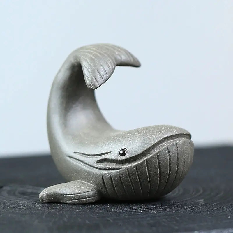 Gray ceramic whale figurine from Ocean Whisper, ideal whale tea pet yixing zisha clay guide