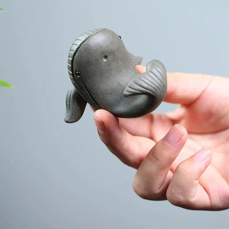 Gray ceramic whale figurine from Ocean Whisper, perfect whale tea pet in Yixing Zisha clay